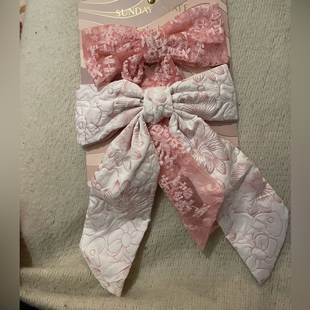 Two bow fabric barrettes